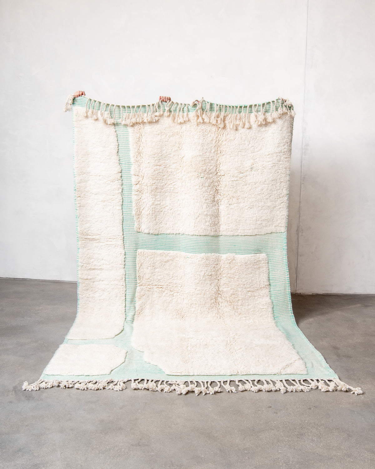 Modern, designer, handcrafted Berber rug from Morocco. Beniourain carpet with beautiful colours and patterns and fluffy wool texture.